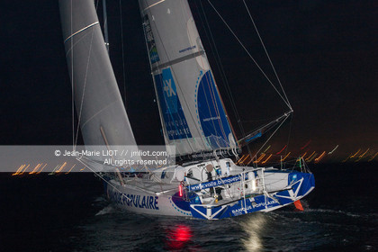 .Arrival in Imoca Banque Populaire Costa Rica on November 19, 2011. Skippers Armel Le Cleac'h and Christopher Pratt placed third in the Imocas category. Photo © Jean-marie Liot   DPPI
