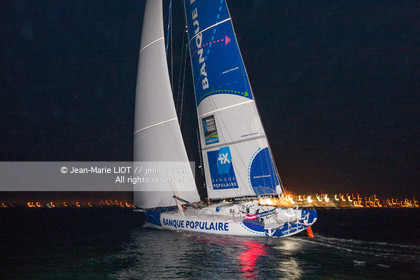 .Arrival in Imoca Banque Populaire Costa Rica on November 19, 2011. Skippers Armel Le Cleac'h and Christopher Pratt placed third in the Imocas category. Photo © Jean-marie Liot   DPPI