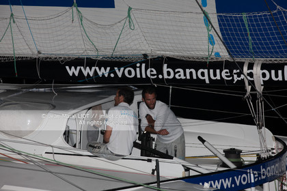 .Arrival in Imoca Banque Populaire Costa Rica on November 19, 2011. Skippers Armel Le Cleac'h and Christopher Pratt placed third in the Imocas category. Photo © Jean-marie Liot   DPPI