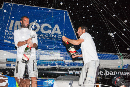 .Arrival in Imoca Banque Populaire Costa Rica on November 19, 2011. Skippers Armel Le Cleac'h and Christopher Pratt placed third in the Imocas category. Photo © Jean-marie Liot   DPPI