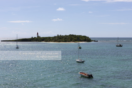 .Guadeloupe is a French overseas department located in the Antilles archipelago. The island is bordered on one side by the Caribbean Sea and the Atlantic Ocean ..The Guadeloupe is composed by two islands: Grande -Terre and Basse-Terre..Photo © Jean -Marie Liot