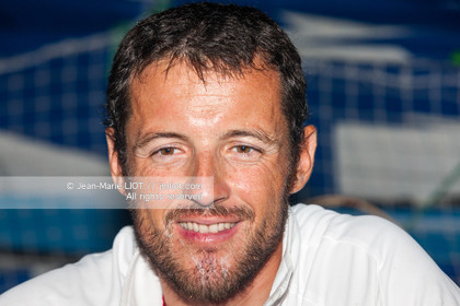 .Arrival in Imoca Banque Populaire Costa Rica on November 19, 2011. Skippers Armel Le Cleac'h and Christopher Pratt placed third in the Imocas category. Photo © Jean-marie Liot   DPPI