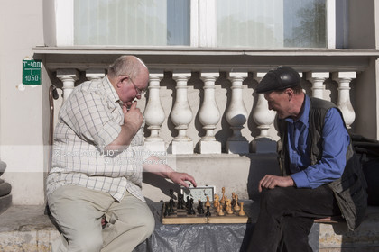 .Russia, Saint Petersburg, listed as World Heritage by UNESCO, in the city streets, man playing chess