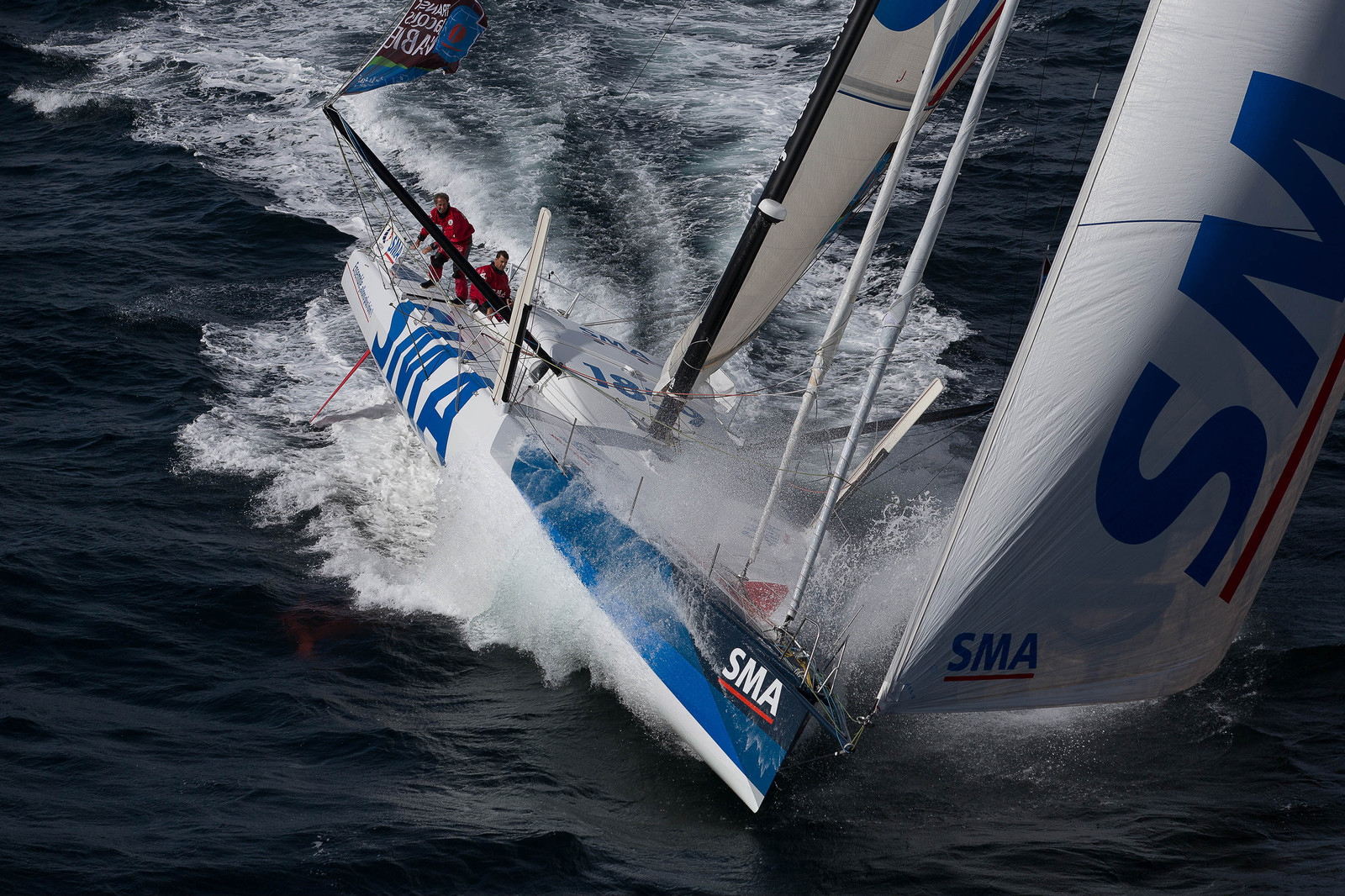 Paul Meilhat et Michel Desjoyeaux à l'entrainement sur IMOCA SMA avant le départ de la Transat Jacques vabre 2015 au départ du Havre et à destination de Itajaï au Brésil..Groix, 16 09 2015, Photo © Jean-Marie LIOT   DPPI.