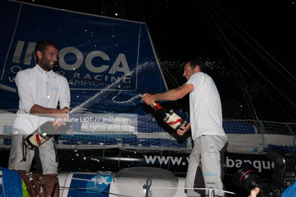 .Arrival in Imoca Banque Populaire Costa Rica on November 19, 2011. Skippers Armel Le Cleac'h and Christopher Pratt placed third in the Imocas category. Photo © Jean-marie Liot   DPPI
