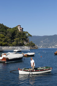 .Portofino,  the pretty port  in Italian is located in the hollow of a cove on the Ligurian coast. This small fishing port became one of the most exclusive resorts in Italy , however, has not lost its charm ..Photo © Jean -Marie Liot