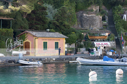 .Portofino,  the pretty port  in Italian is located in the hollow of a cove on the Ligurian coast. This small fishing port became one of the most exclusive resorts in Italy , however, has not lost its charm ..Photo © Jean -Marie Liot