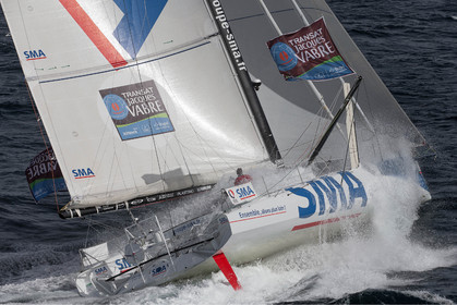 Paul Meilhat et Michel Desjoyeaux à l'entrainement sur IMOCA SMA avant le départ de la Transat Jacques vabre 2015 au départ du Havre et à destination de Itajaï au Brésil..Groix, 16 09 2015, Photo © Jean-Marie LIOT   DPPI.