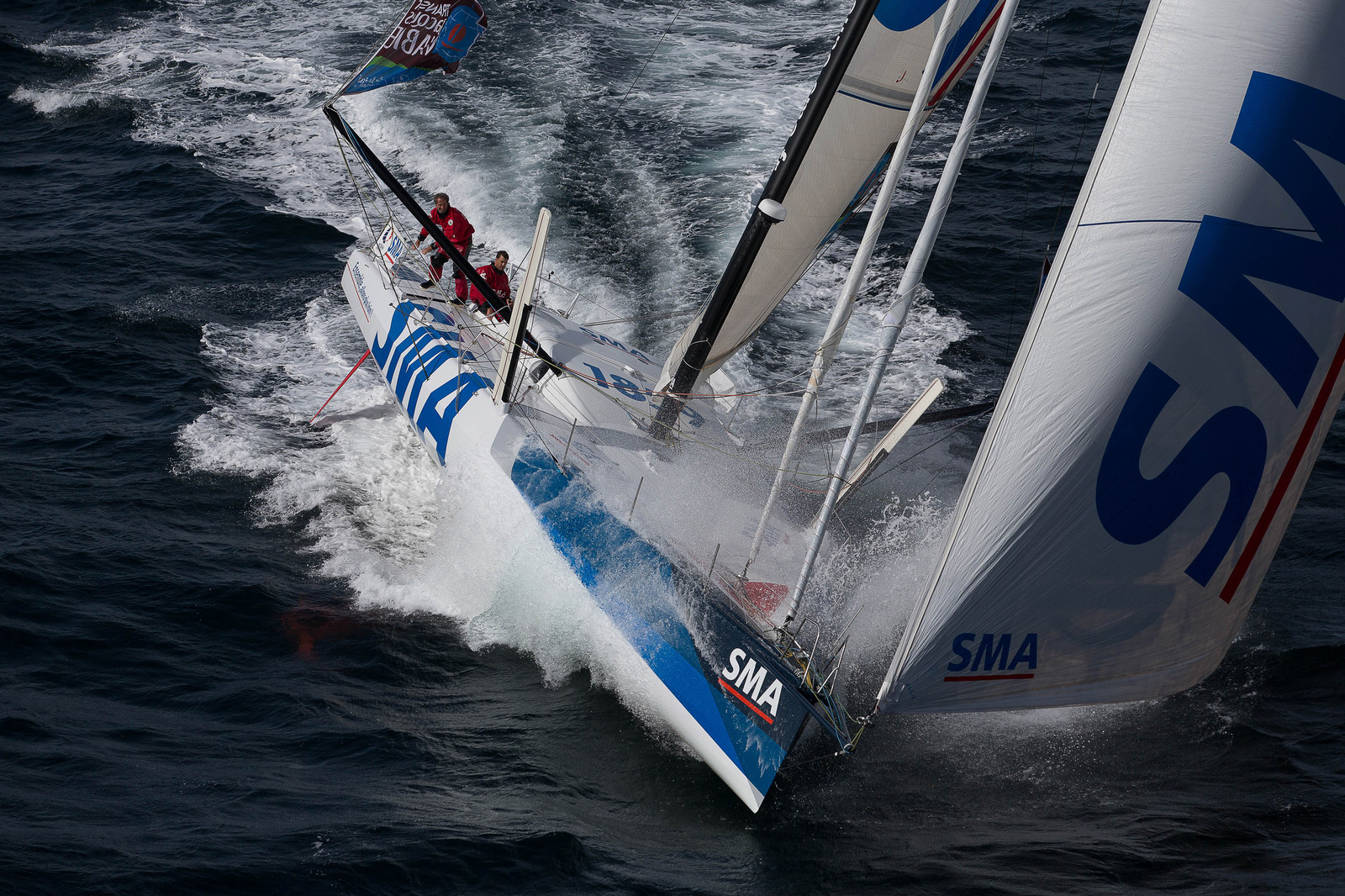 Paul Meilhat et Michel Desjoyeaux à l'entrainement sur IMOCA SMA avant le départ de la Transat Jacques vabre 2015 au départ du Havre et à destination de Itajaï au Brésil..Groix, 16 09 2015, Photo © Jean-Marie LIOT   DPPI.