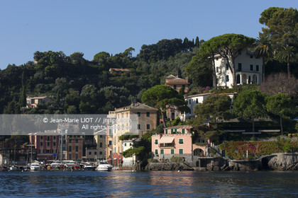 .Portofino,  the pretty port  in Italian is located in the hollow of a cove on the Ligurian coast. This small fishing port became one of the most exclusive resorts in Italy , however, has not lost its charm ..Photo © Jean -Marie Liot
