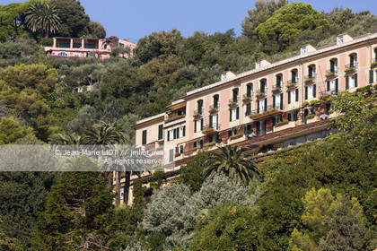 .Portofino,  the pretty port  in Italian is located in the hollow of a cove on the Ligurian coast. This small fishing port became one of the most exclusive resorts in Italy , however, has not lost its charm ..Photo © Jean -Marie Liot