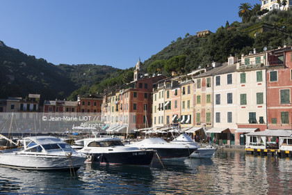 .Portofino,  the pretty port  in Italian is located in the hollow of a cove on the Ligurian coast. This small fishing port became one of the most exclusive resorts in Italy , however, has not lost its charm ..Photo © Jean -Marie Liot